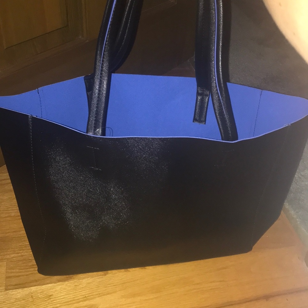 NWT super cute black tote with blue interior